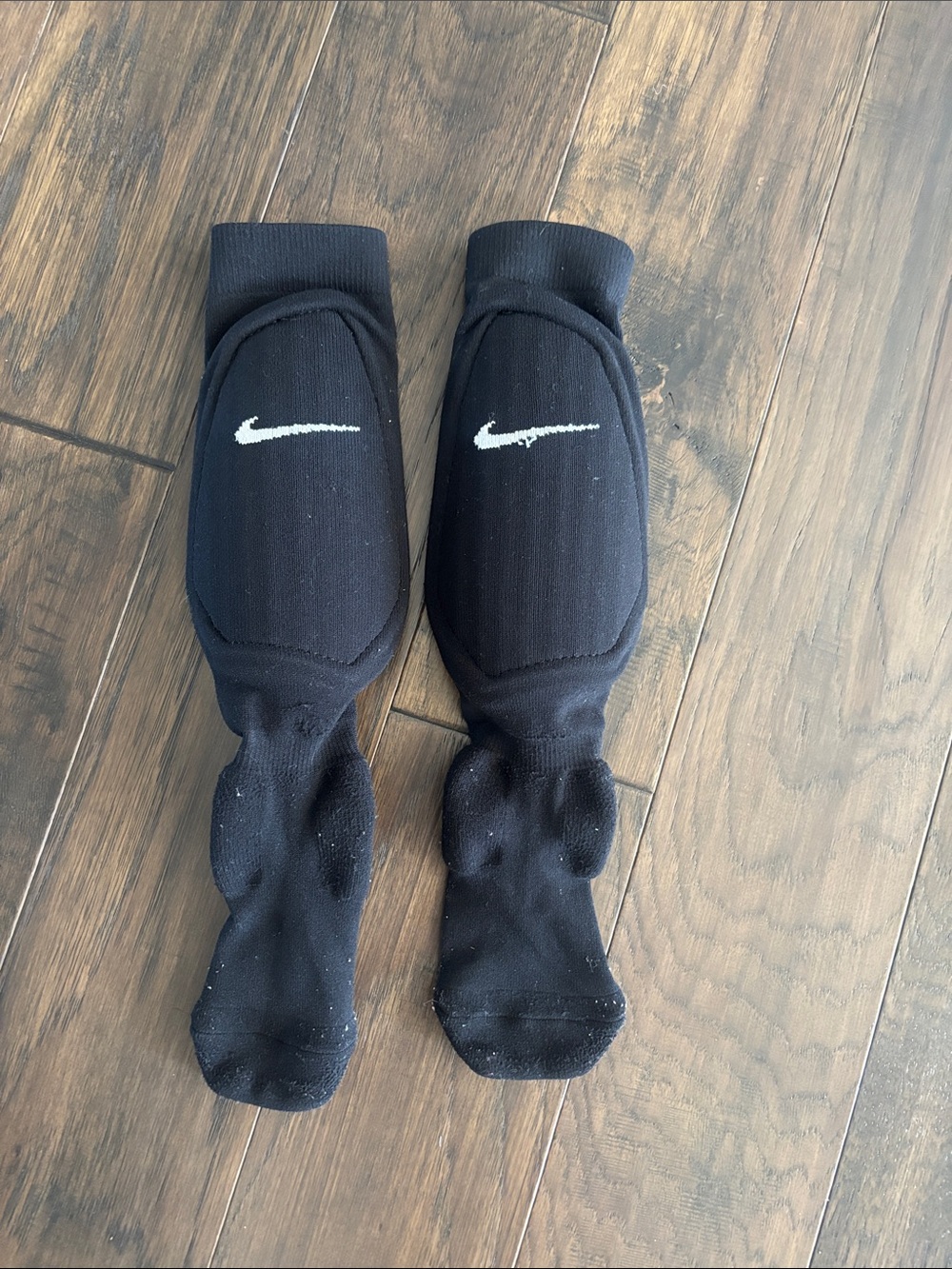 Nike Black Athletic Padded Shin Sock Pair with White Swoosh